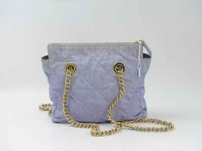 PRADA. Bag in lila quilted fabric, chain...