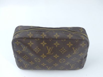 LOUIS VUITTON. Toilet bag in monogram canvas...