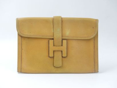 HERMES. Jige clutch bag in Courchevel gold...