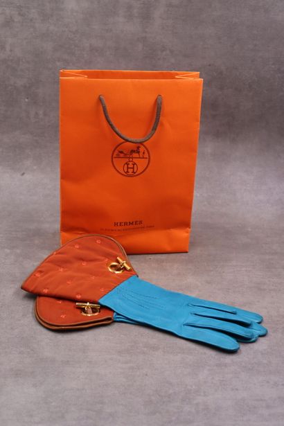 HERMES. Pair of turquoise leather gloves...