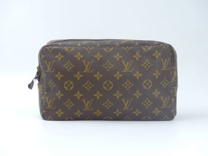 LOUIS VUITTON. Toilet bag in monogram canvas,...