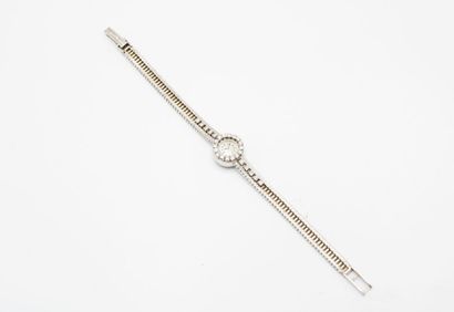 OMEGA
Lady's watch in white gold and platinum...