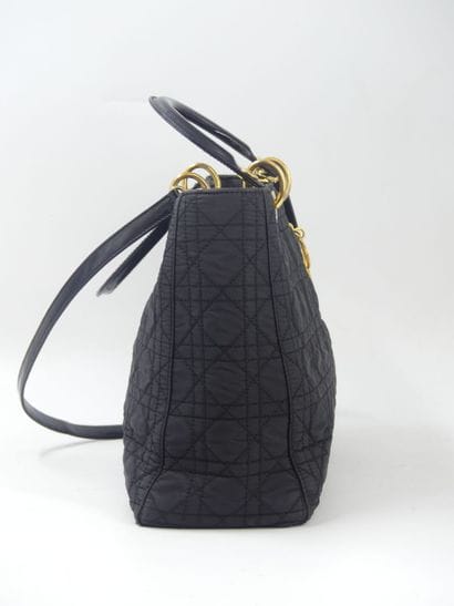 Christian Dior. Lady Dior handbag in black...