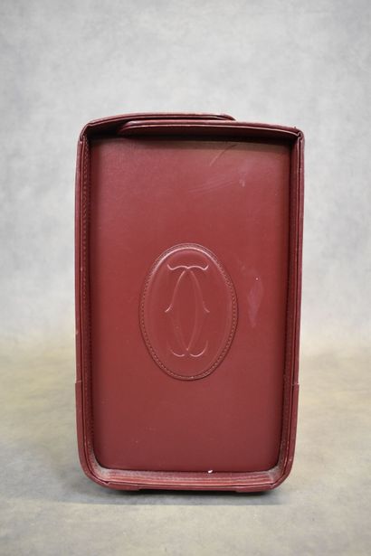 CARTIER. Must. Important briefcase in burgundy...