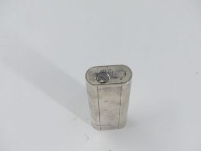 CARTIER. Lighter in silver plated metal,...