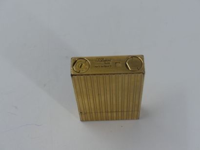 DUPONT. Lighter in gilded metal, monogrammed...