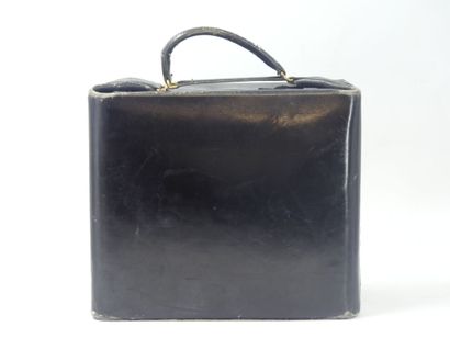 HERMES. Large toiletry bag in black box calf,...