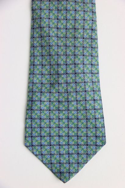 Hermes tie in its box, blue gray color. Very...