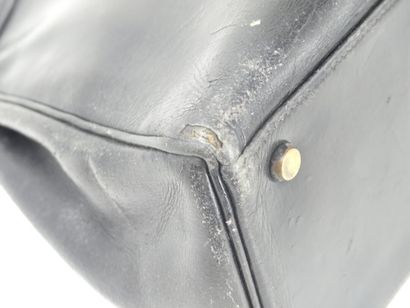 HERMES. Kelly bag 28cm in black box, gold...