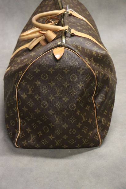 Louis Vuitton. Keepall bag in monogrammed...