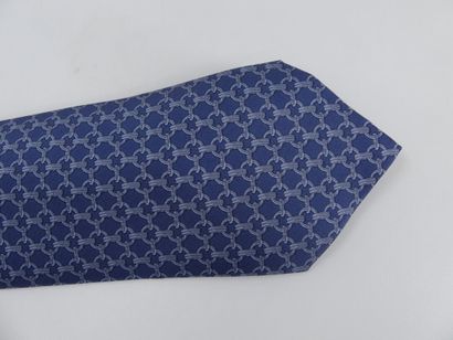 HERMES. Silk tie, navy blue background with...