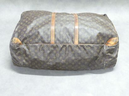 LOUIS VUITTON. Large soft suitcase in monogram...