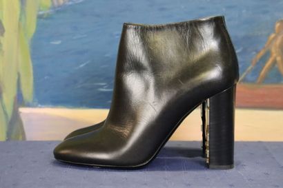 BURBERRY. Pair of black leather heeled boots,...
