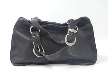 DIOR. Saddle bag in black and gold calfskin,...