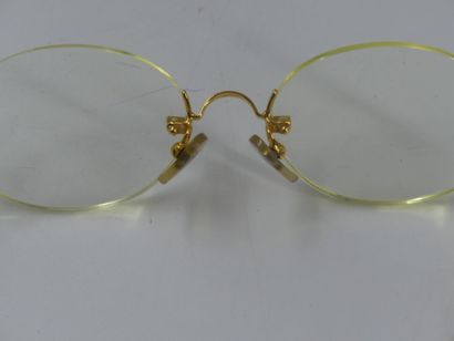 CARTIER, Must. Pair of eyeglasses with gold...