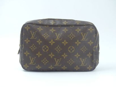 LOUIS VUITTON. Toilet bag in monogram canvas...