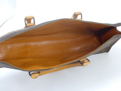 LOUIS VUITTON. Triangular bag in monogram...
