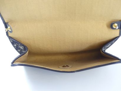 Christian DIOR. Navy leather and damask fabric...