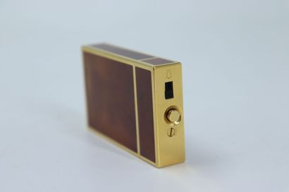 DUPONT. Pocket alarm clock in gilded metal...