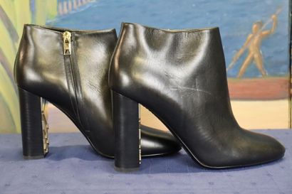 BURBERRY. Pair of black leather heeled boots,...