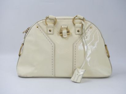 Yves Saint Laurent. Cream patent leather...