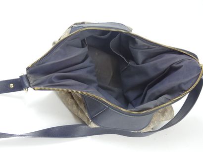 LOUIS VUITTON. Shoulder bag in navy leather...