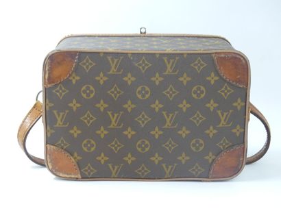 LOUIS VUITTON. Soft vanity in monogram canvas...