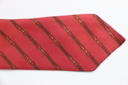 HERMES. Burgundy tie, in its box. Stain