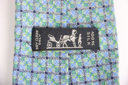 Hermes tie in its box, blue gray color. Very...