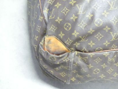 LOUIS VUITTON. Large soft suitcase in monogram...