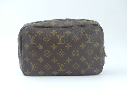 LOUIS VUITTON. Toilet bag in monogram canvas...