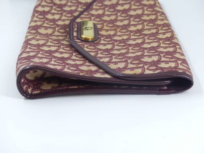 Christian Dior. Clutch in damask canvas and...