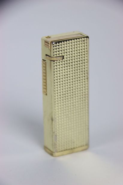 Gilded metal BRIQUET with quadrilles decoration,...