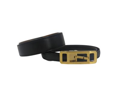 CARTIER. Black leather belt and gold metal...