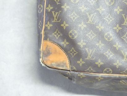 LOUIS VUITTON. Large soft suitcase in monogram...