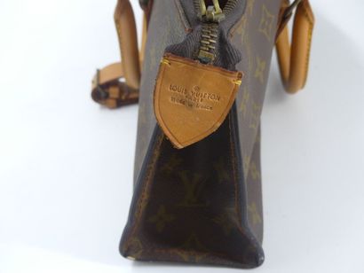 LOUIS VUITTON. Triangular bag in monogram...