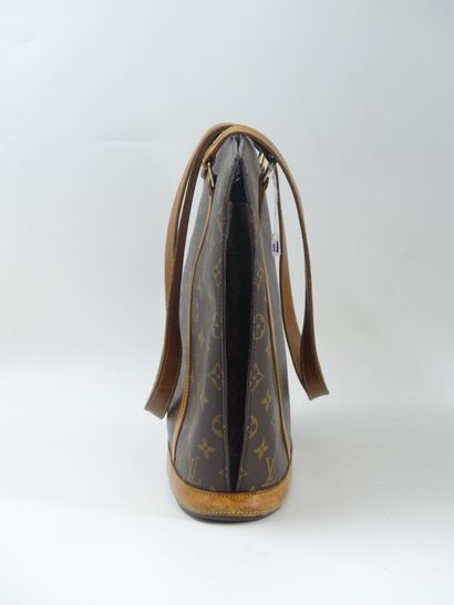 LOUIS VUITTON. Babylone bag in monogram canvas...