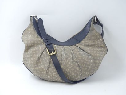 LOUIS VUITTON. Shoulder bag in navy leather...