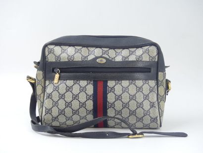 GUCCI. Shoulder bag in navy blue leather...