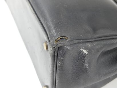 HERMES. Kelly bag 28cm in black box, gold...