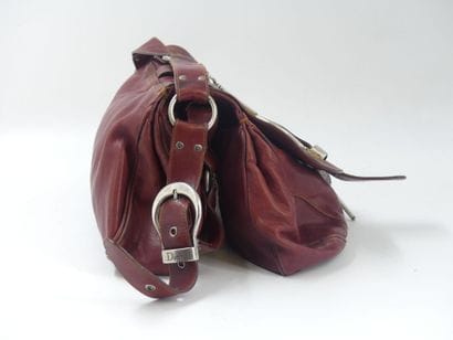 Christian DIOR. Saddle bag in red and gold...