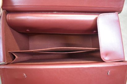 CARTIER. Must. Important briefcase in burgundy...