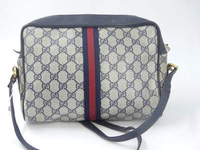 GUCCI. Shoulder bag in navy blue leather...