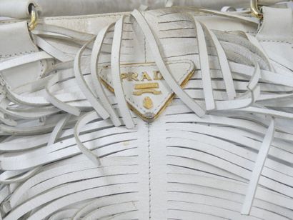 PRADA. White leather bag with bangs, inside...