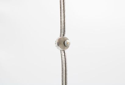 OMEGA
Lady's watch in white gold and platinum...