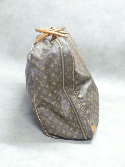 LOUIS VUITTON. Large soft suitcase in monogram...