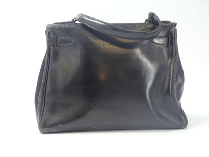 HERMES. Kelly bag 28cm in black box, gold...