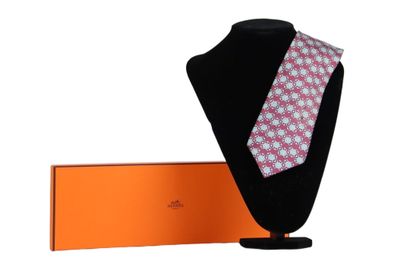 HERMES. Tie in its box, red or burgundy color....