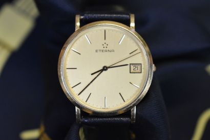 ETERNA. Men's watch with yellow gold case...