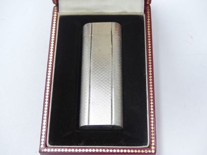 CARTIER. Lighter in silver plated metal,...